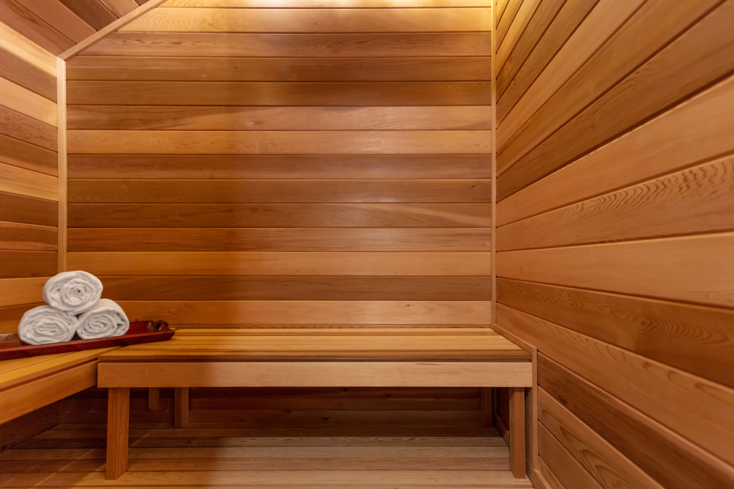 internal shot of sauna room with towels